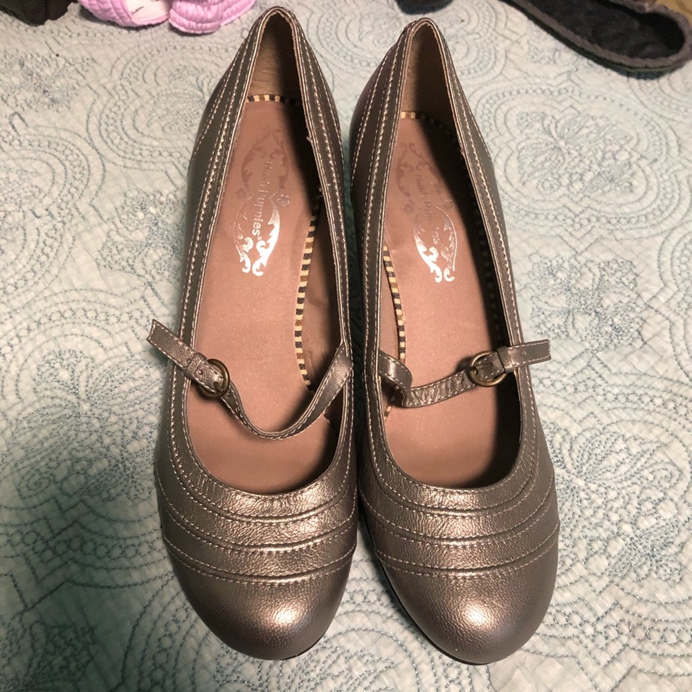 Silver maryjane heels.